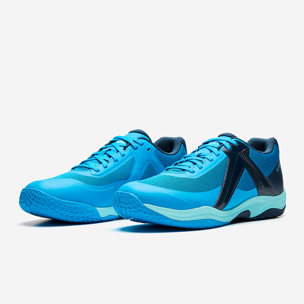 Blue athletic shoes with black accents on a light white background